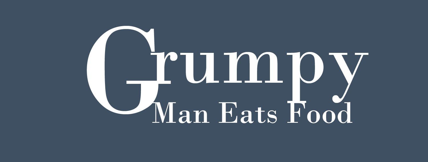 Grumpy Man Eats Food